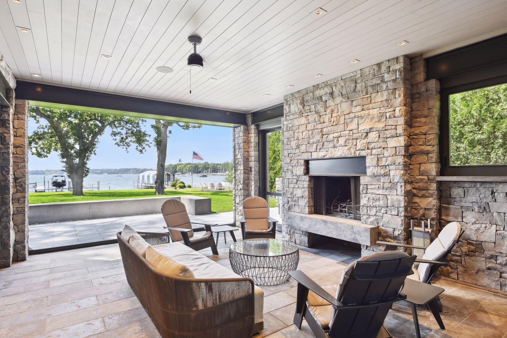 Adjacent outdoor space to lower lake room with phantom screens