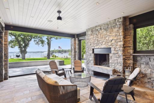 Adjacent outdoor space to lower lake room with phantom screens