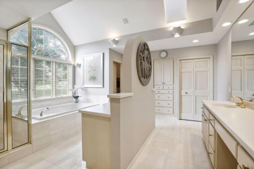 Owner's Bathroom with Double Sinks and Water Closet