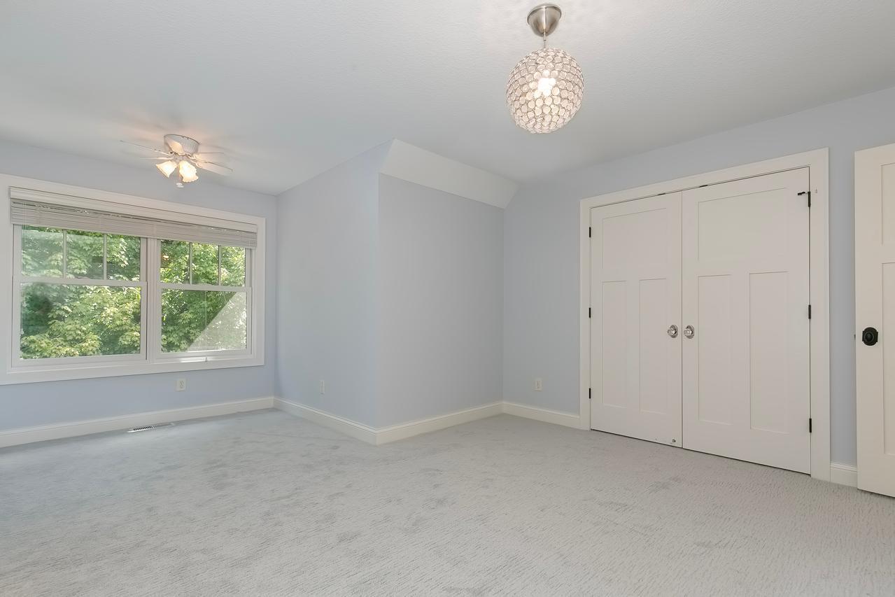 Upper level bedroom with a view