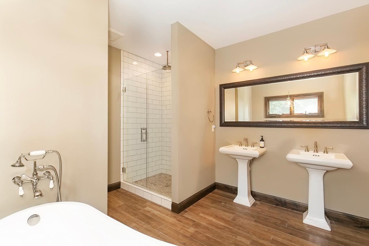 Lower level with double sinks and shower