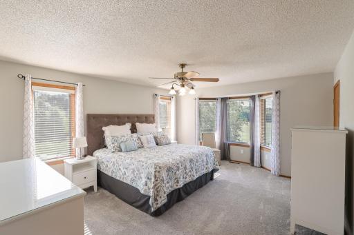 Master bedroom has bay window