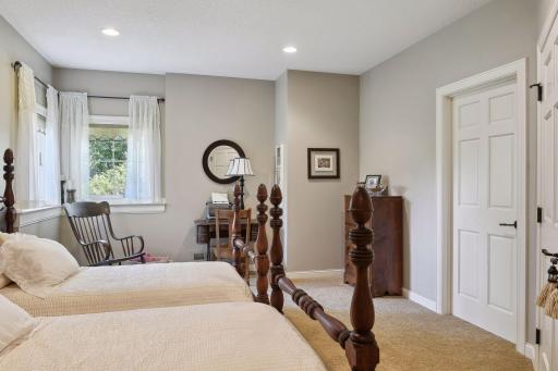 Lower level bedroom six with an extra large storage area.