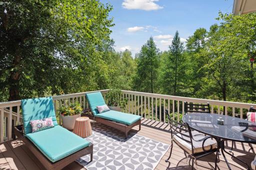 Outdoor deck with stairs to backyard area