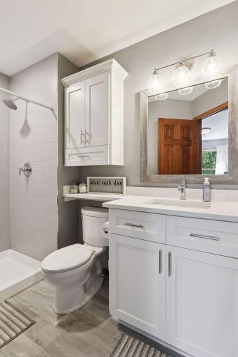 Updated bath with tile shower and quartz vanity top