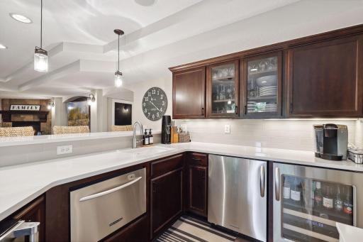 New quartz tops, tile backsplash, sink and faucet