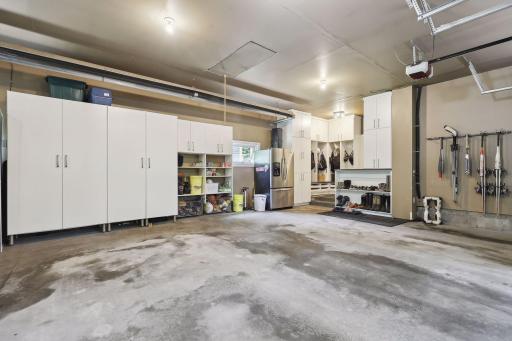 Oversized 3 car garage with custom built ins, and sports lockers