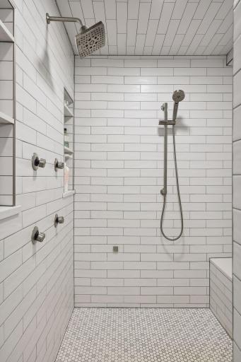 Tile STEAM shower with two shower heads and body sprays- two tile niches for shower products