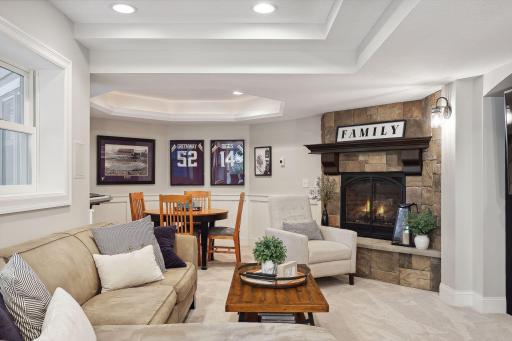 Game area with shelf ceiling and custom lighting