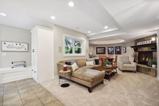 Cozy family room- built in storage for outdoor entertaining items