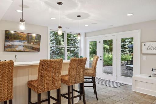 Bar area has best views in the house- walks out to the pond and outdoor living space