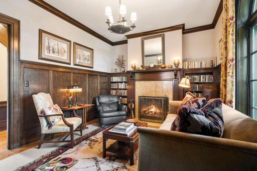 Handsome Study with Fireplace, Oak Paneling and Amazing Original Built-ins.