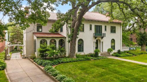 Symmetry, Arched Windows, Wrought Iron Balcony, Terra Cotta Roof... !!!