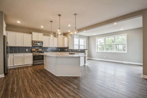 Open concept throughout this main level! So much room to entertain and enjoy being home with family and friends.