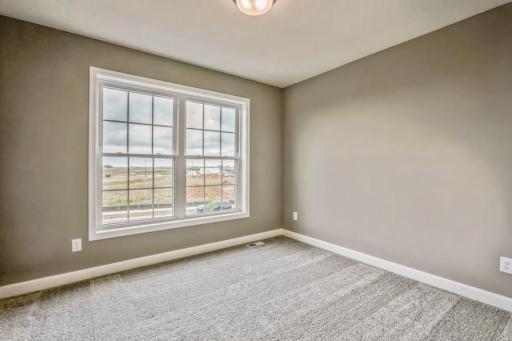 Upstairs bedrooms are great sizes! Photos of actual home for sale.