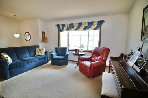 Living room with vaulted ceilings and lots of natural light..jpg