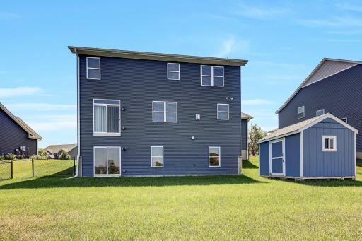 Fully fenced semi-private backyard