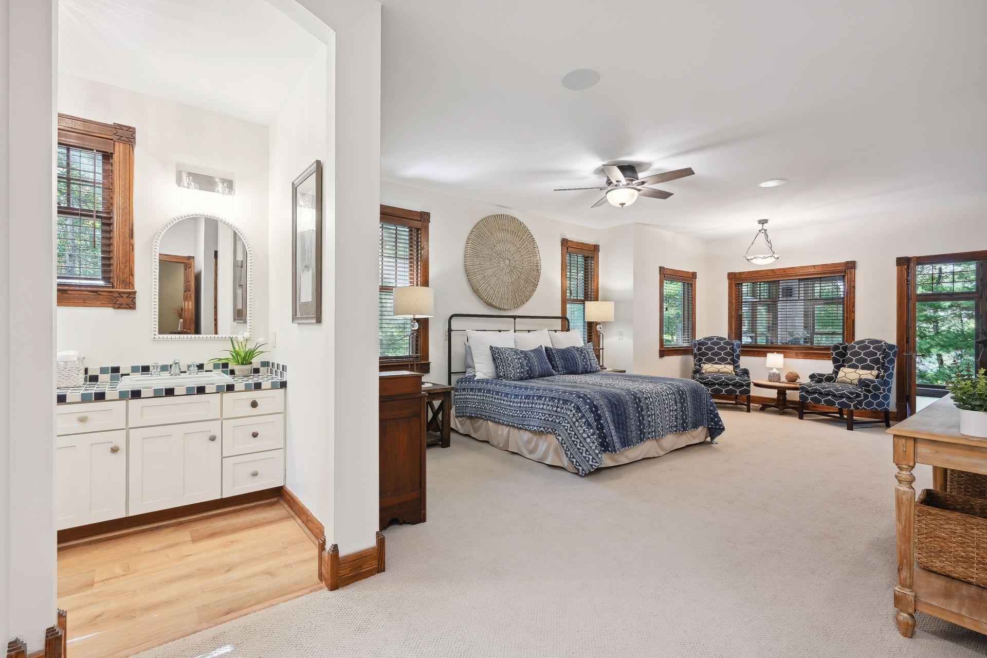 Head into the refreshed owner's bathroom within your suite. All new lighting and mirrors give this an updated feel.
