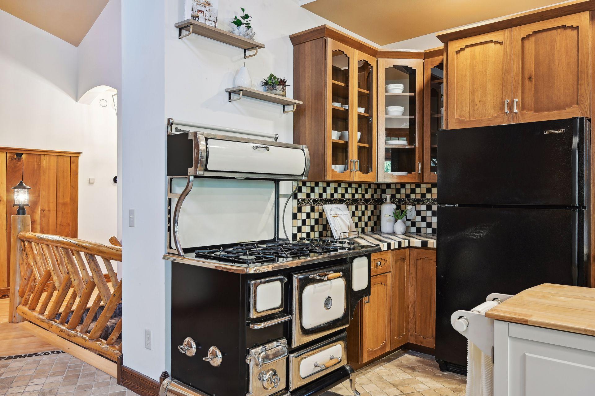 Oh this stove! This is a vintage Heartland gas stove that will have all of your guests talking. They are still sold new!