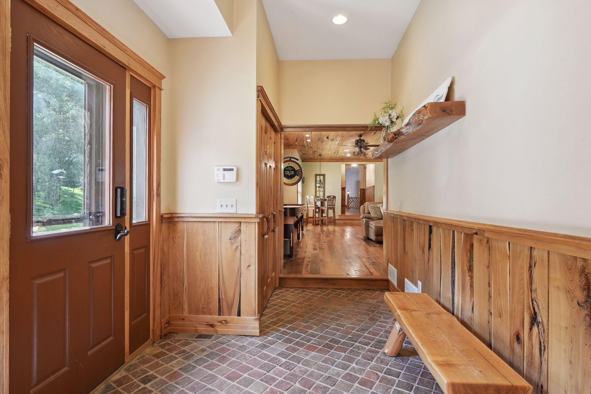 Walk through the amusement room to the guest wing. Complete with it's own entrance, guests will have easy come and go access.