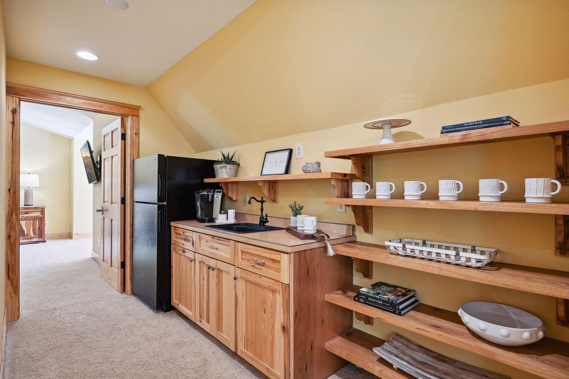 The kitchenette in the guest suite has everything to enjoy a lazy morning with coffee and treats.