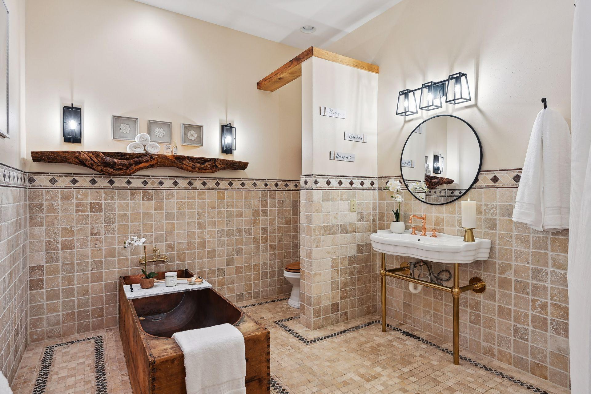 Welcome to the spa! The lakeside guest suite welcomes guests with a spa bathroom experience. Soak in the stress free way of life.