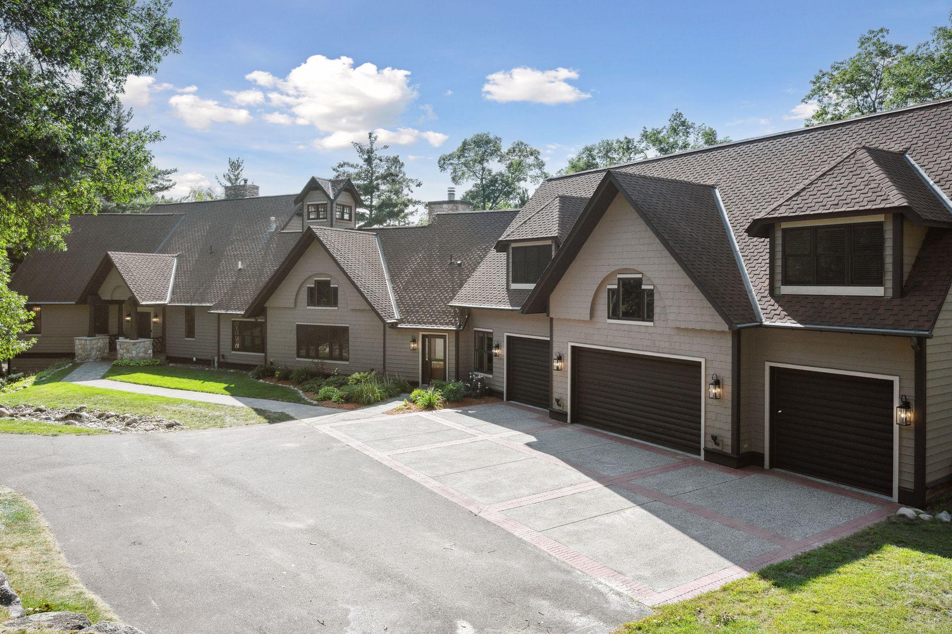 A four car garage is spacious enough for all your favorite lake toys.