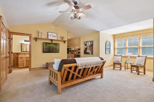 The suite also has a reading nook and attached bathroom. Use this space for overflow sleeping or just relaxing.