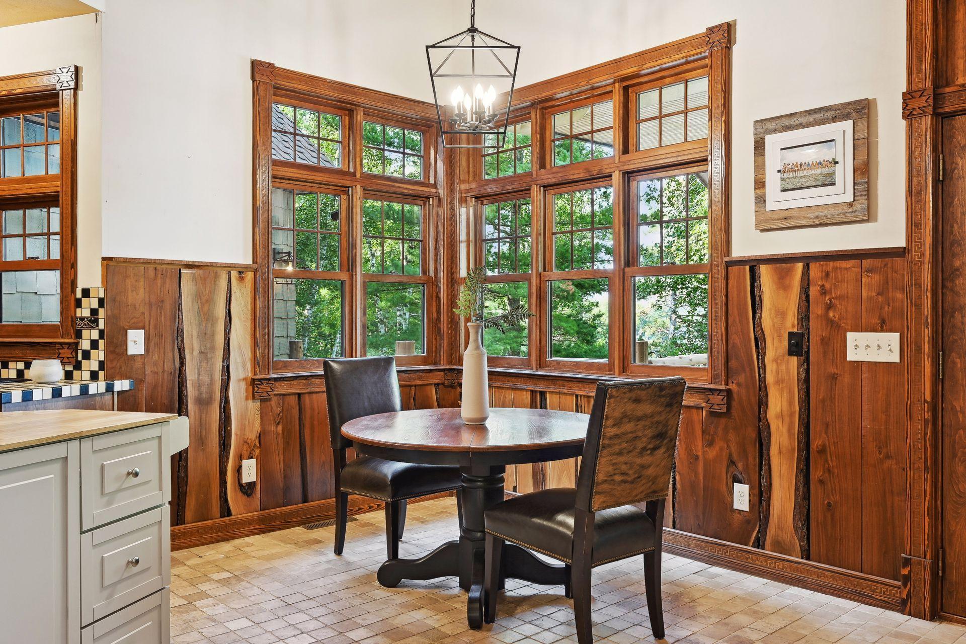 The detailed live wood edge paneling is a high end feature that gives the home a refined up North feel.