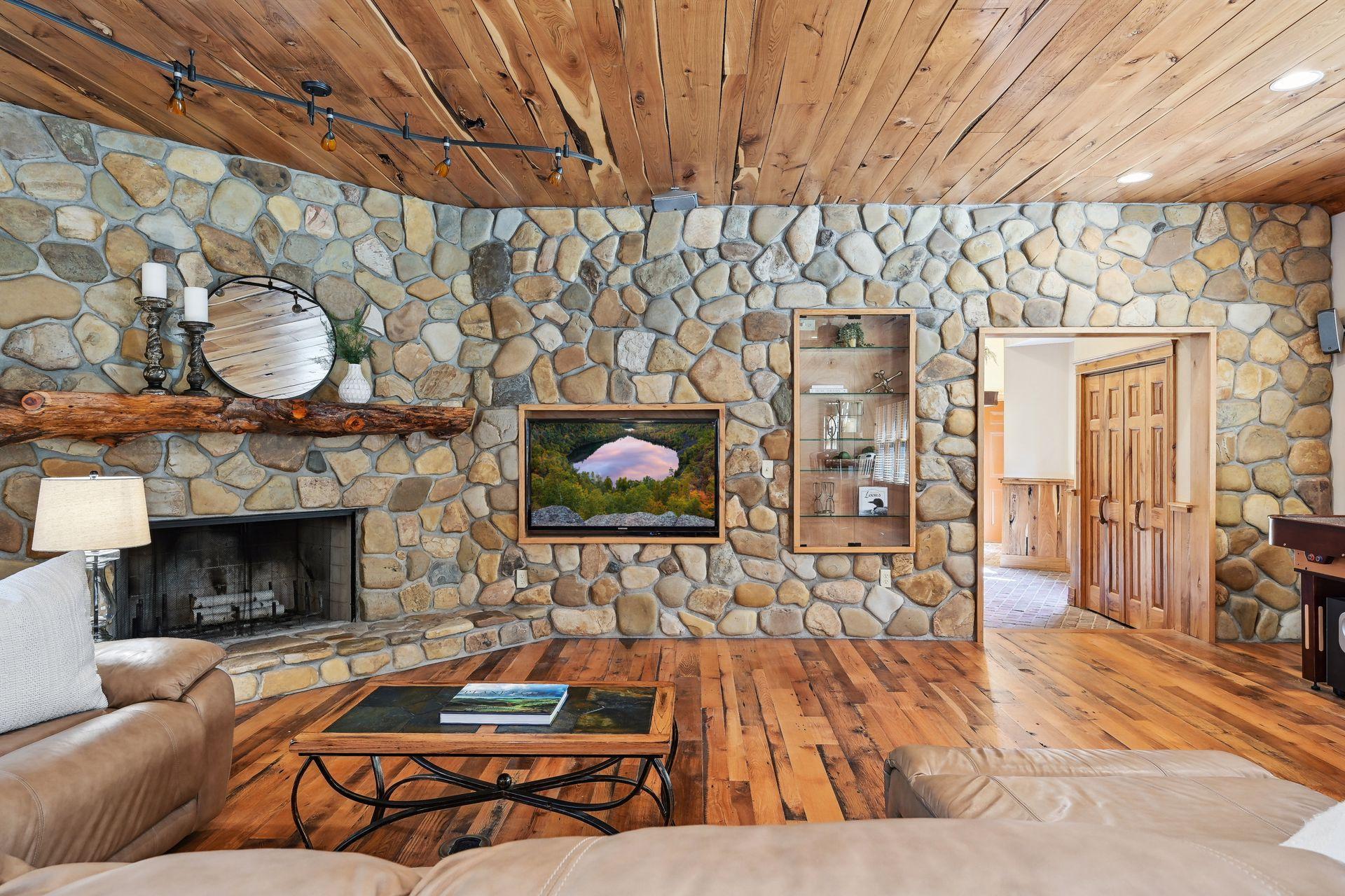 One of four fireplaces throughout the home give this room an extra element of relaxation.