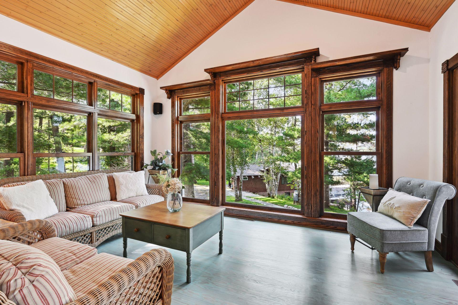 Never miss a sunset or lake view from your own private four season porch with hardwood flooring and oversized windows.