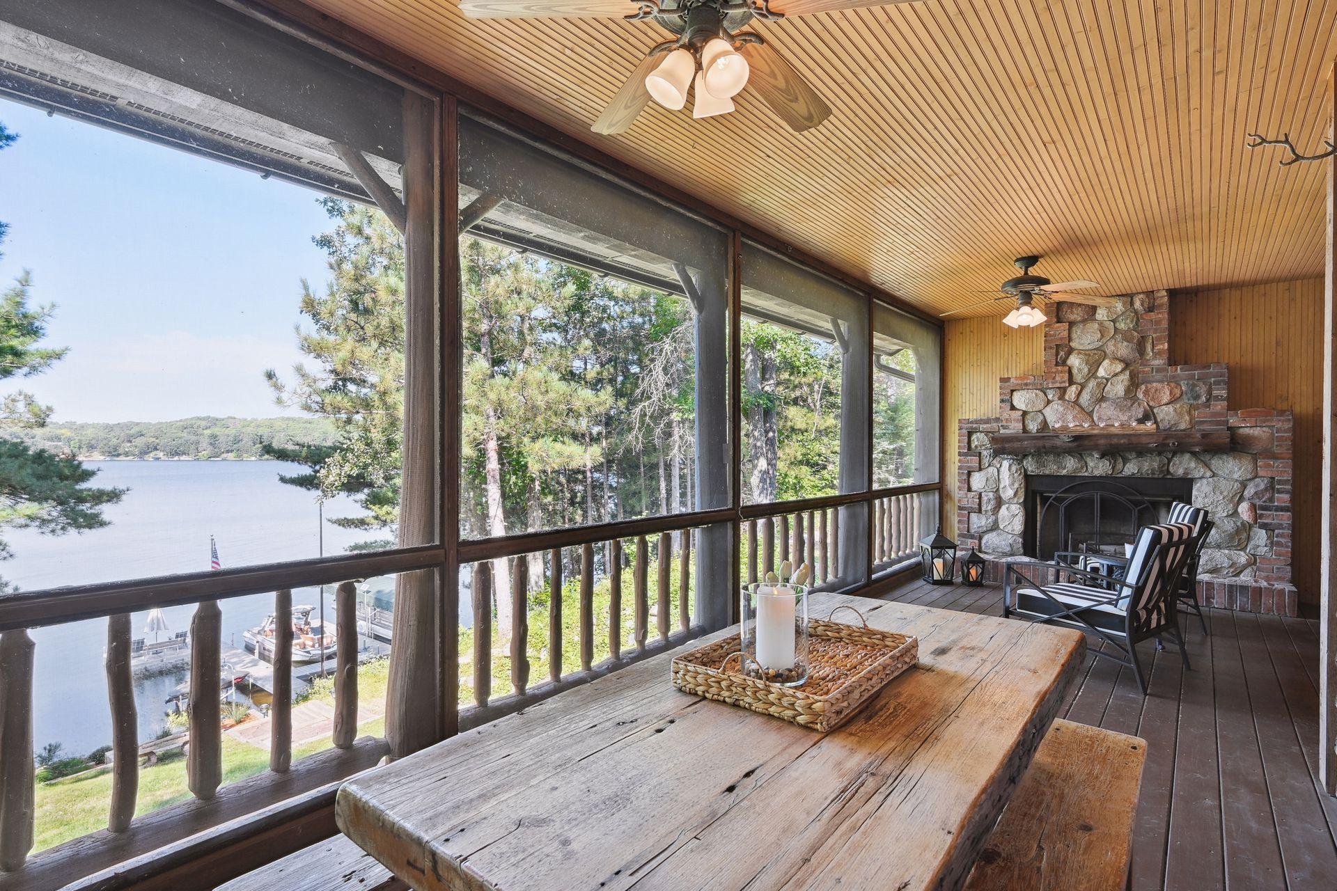 Relax by the wood burning fireplace as you watch the boaters come in off the lake.