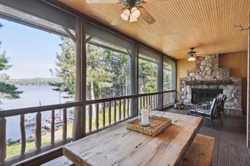 Relax by the wood burning fireplace as you watch the boaters come in off the lake.