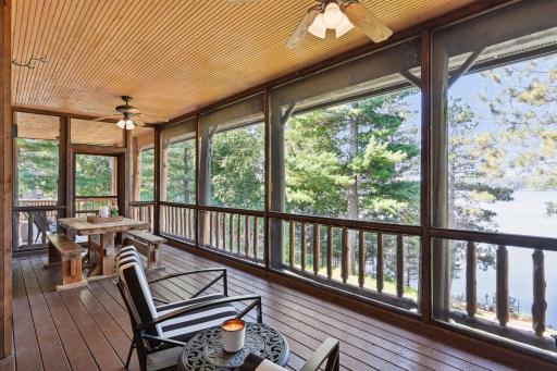 Escape the buggy nights in the lakeside screen porch that also steps out onto the deck.