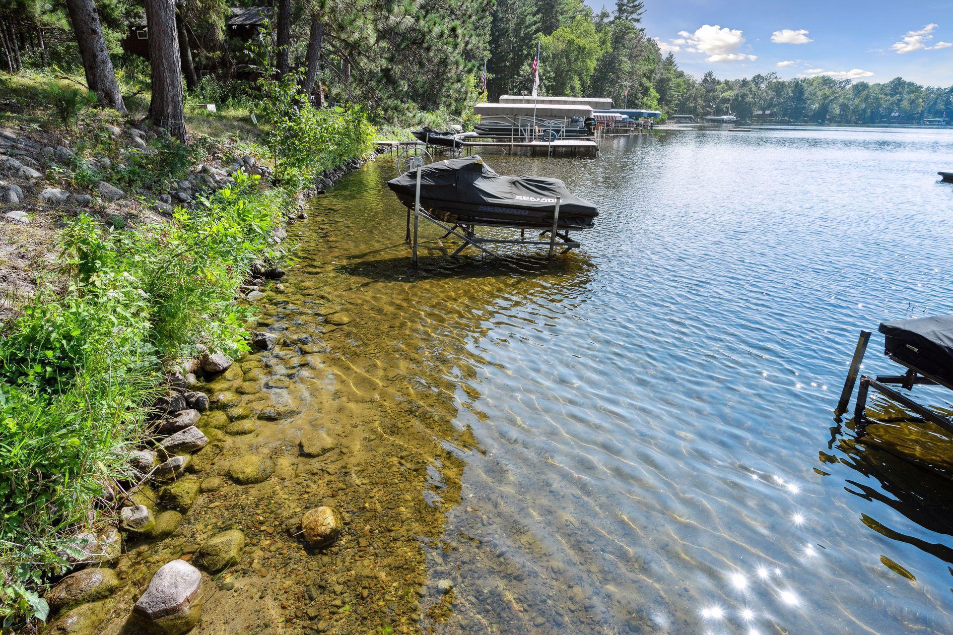 Weed free and ultra clear water make this a premier place to live on the lake.