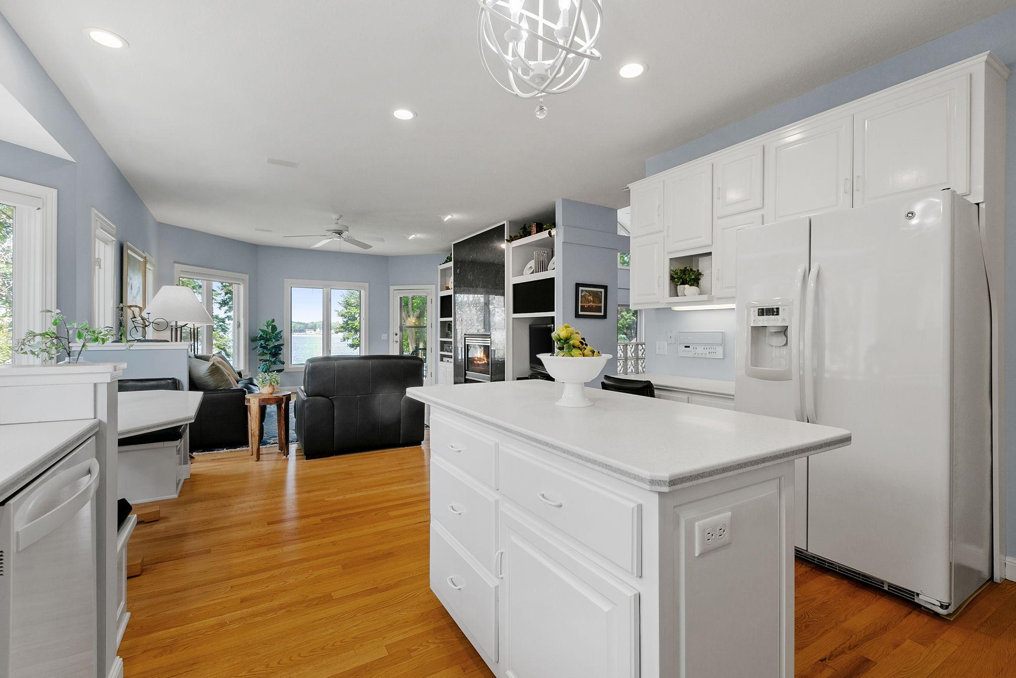 "Eat-in" center island overlooking the family room w/ stunning views