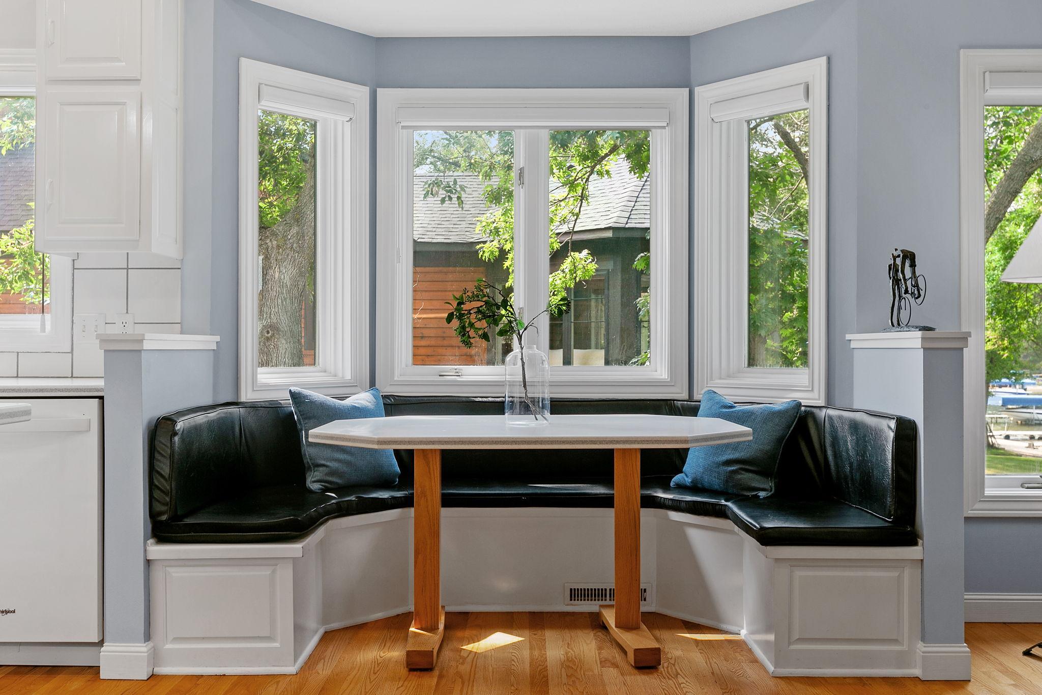 Large bay window offers built-in bench, perfect for dining!