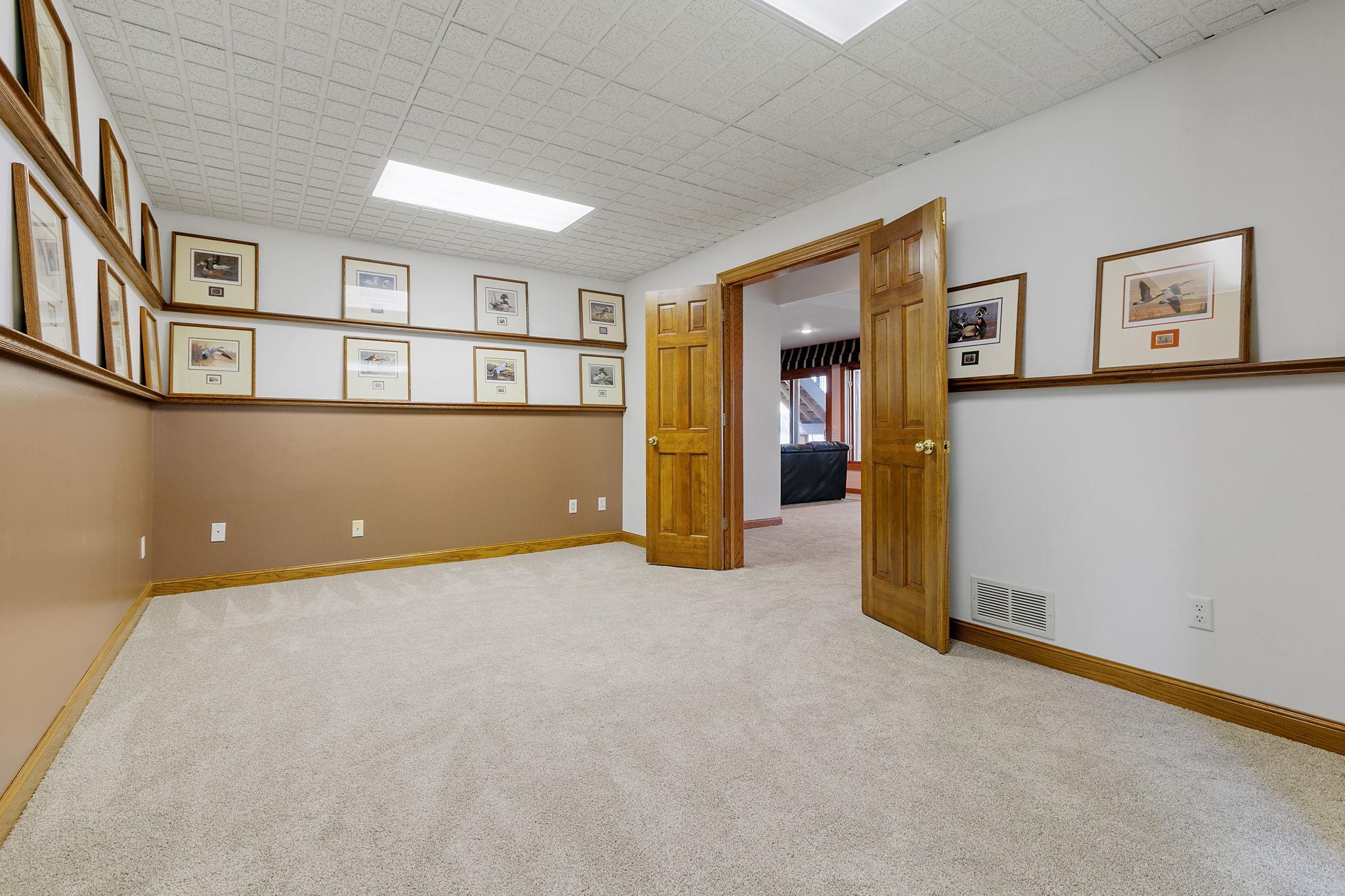 Flex Room / Bedroom - French doors open into this useful space