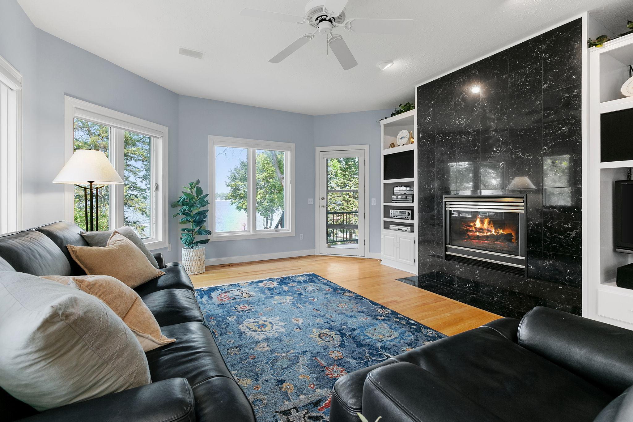 Full glass entry door w/ access to the deck and property.