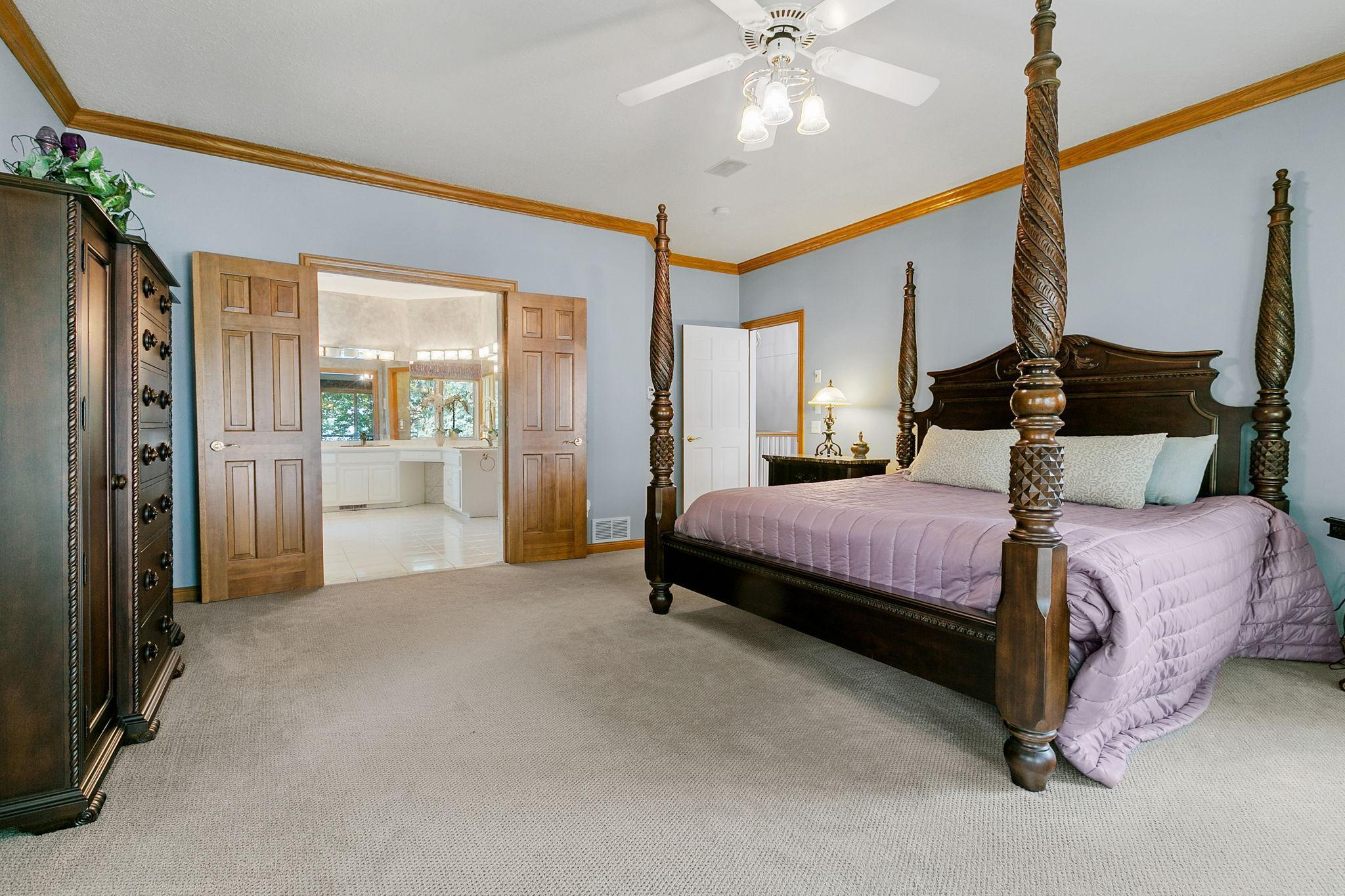 Other features include aak crown molding, walk-in closet and French doors which open into the generously sized master bathroom