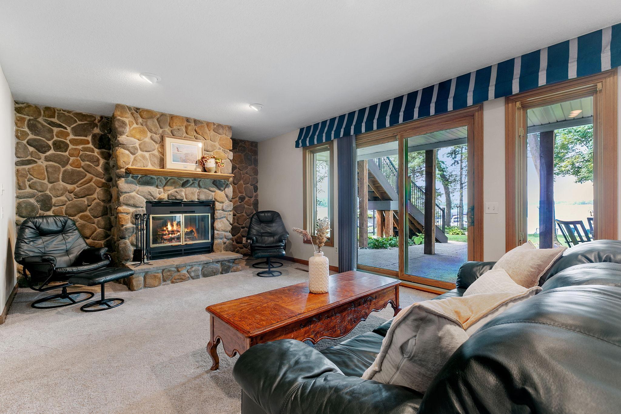 Walk-out lower level Family Room also features a full glass patio door w/ access to the lower level patio