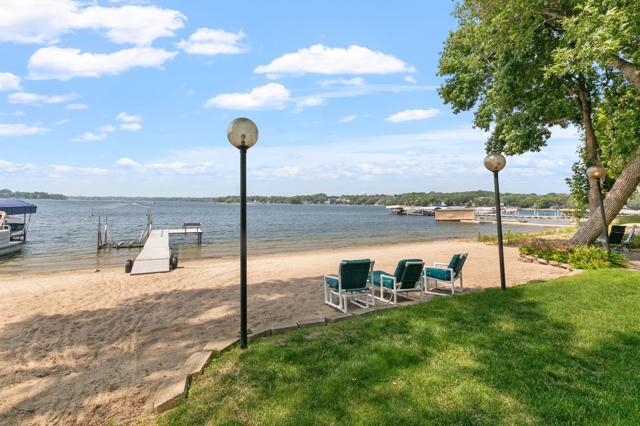 92 Feet of sandy lakeshore with gentle grading into the lake