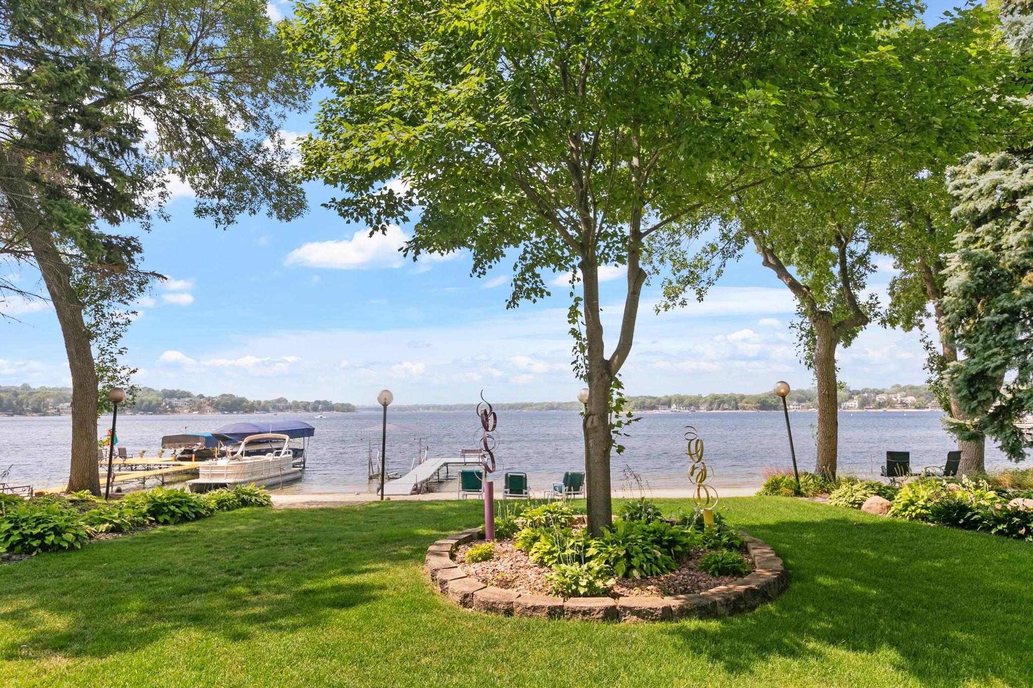 Expansive yard w/ stunning views of lower Prior Lake