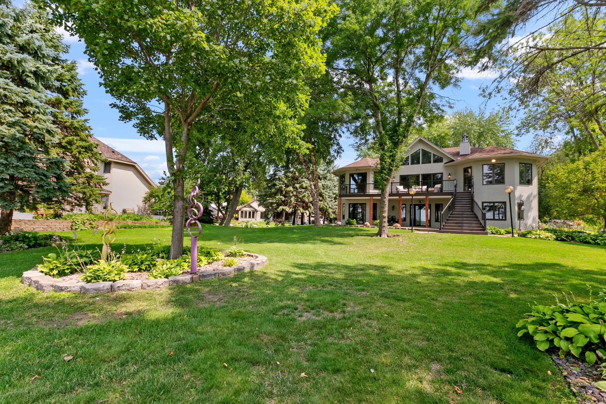 .55 acre property in a highly sought after, lake friendly neighborhood