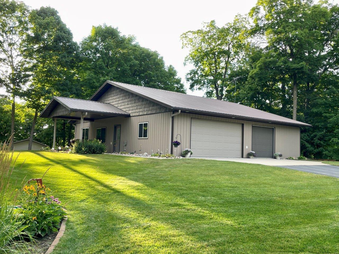 12-Attached 3-car garage is heated and finished