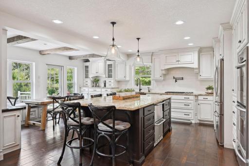 Grandiose Kitchen with massive island and gourmet features throughout