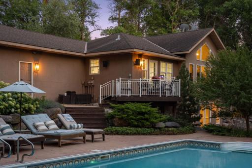 The backyard of your dreams with room to swim, lounge, grill, gather, and relax!