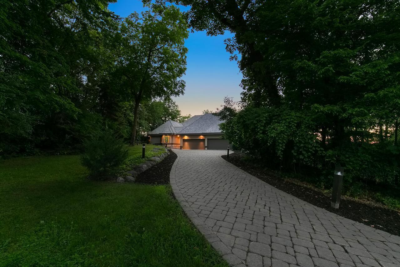 Paver long drive to a beautiful home