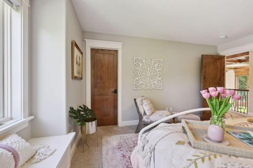 Upper level bedroom three with walk-in closet
