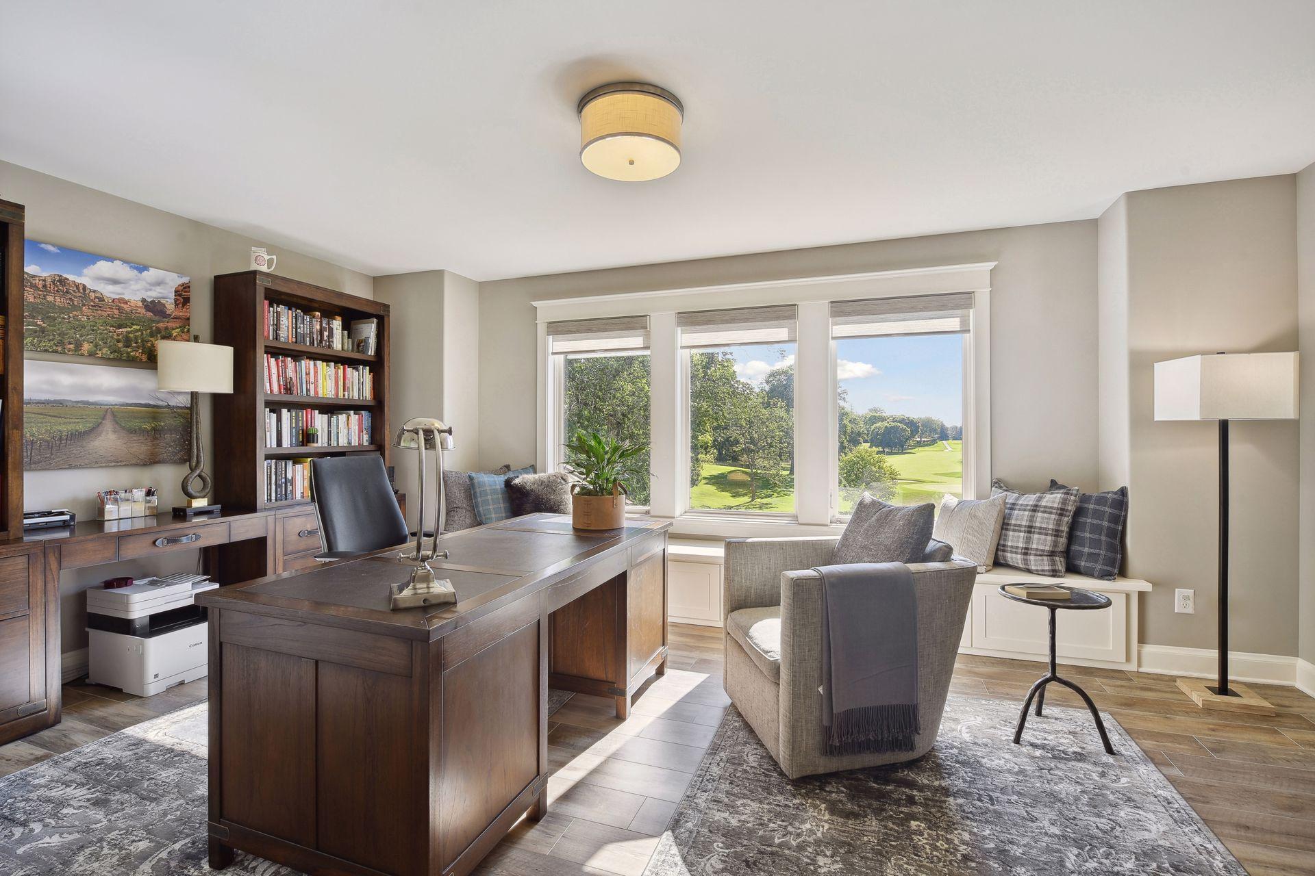 Junior suite bedroom with large windows overlooking golf course, walk in closet and luxury vinyl flooring-0055.jpg